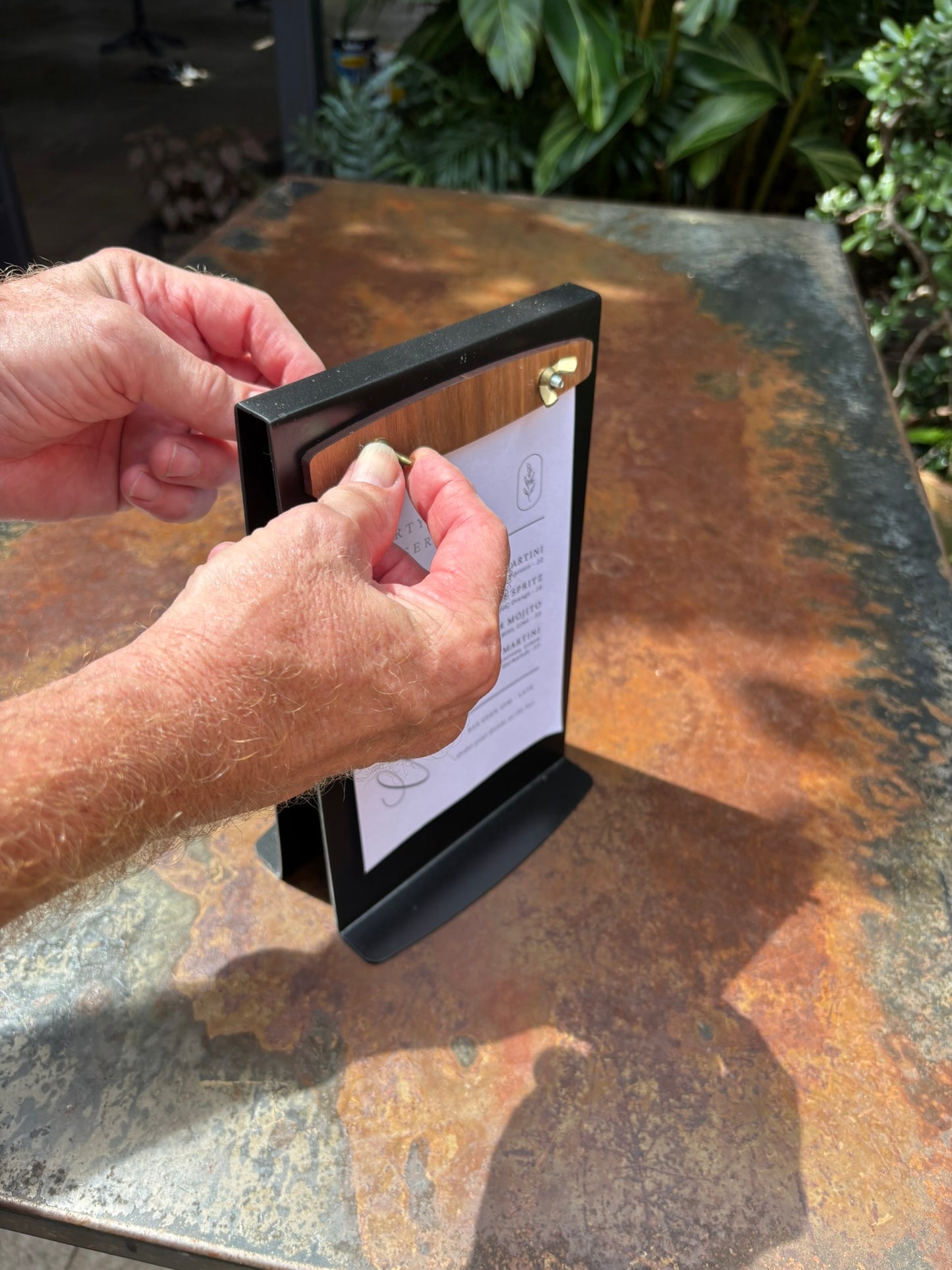 Monarch Cafe Signage being assembled